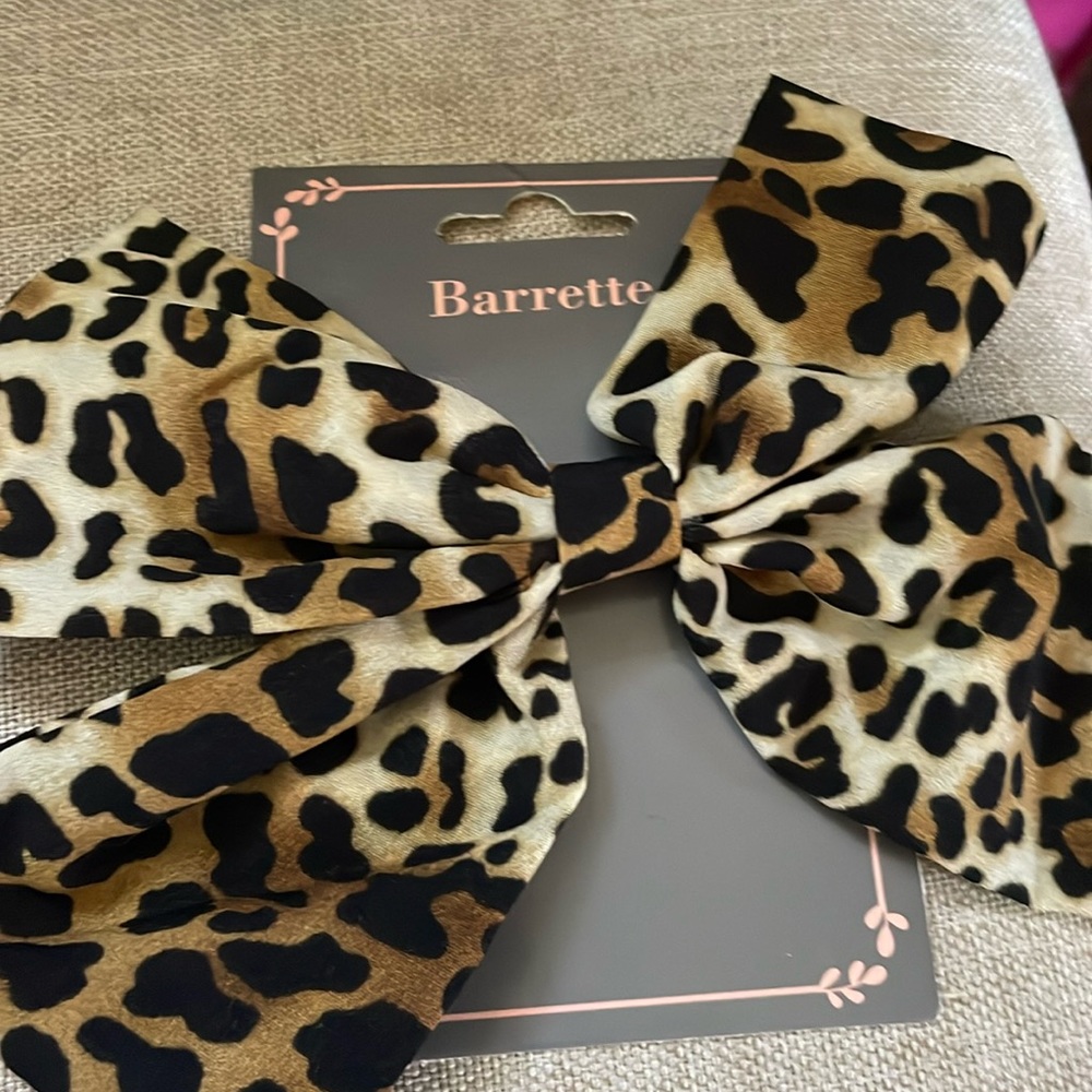 Pink hair barrette and cheetah print barrette